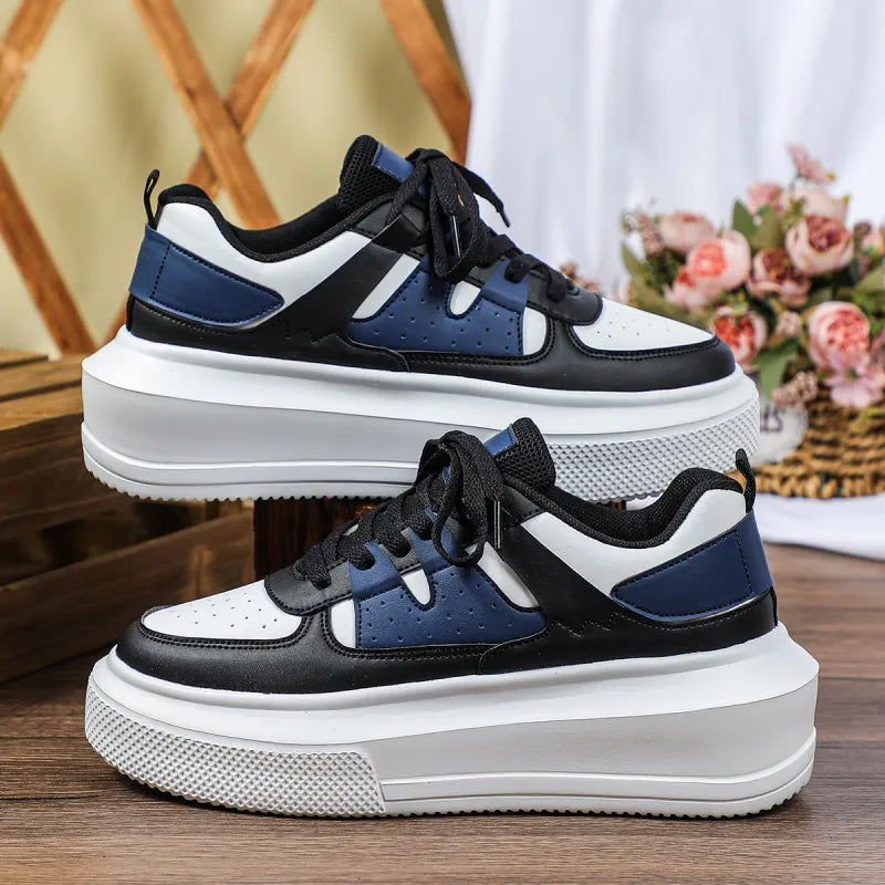 Comfortable women's athletic platform sneakers with breathable perforated upper and classic lace-up.