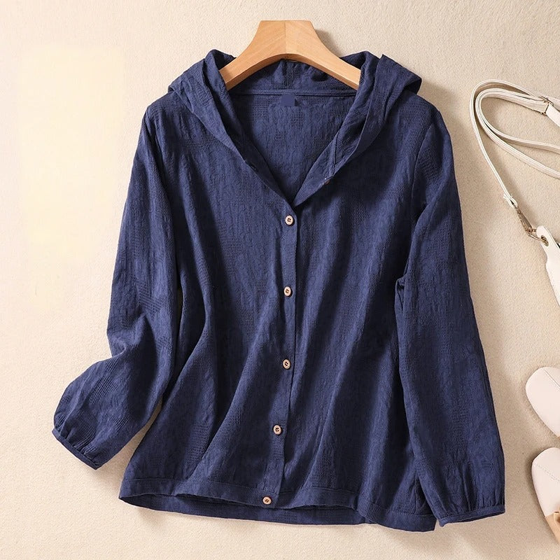 Model wearing a navy blue relaxed fit hooded shirt for women, showcasing effortless casual style.