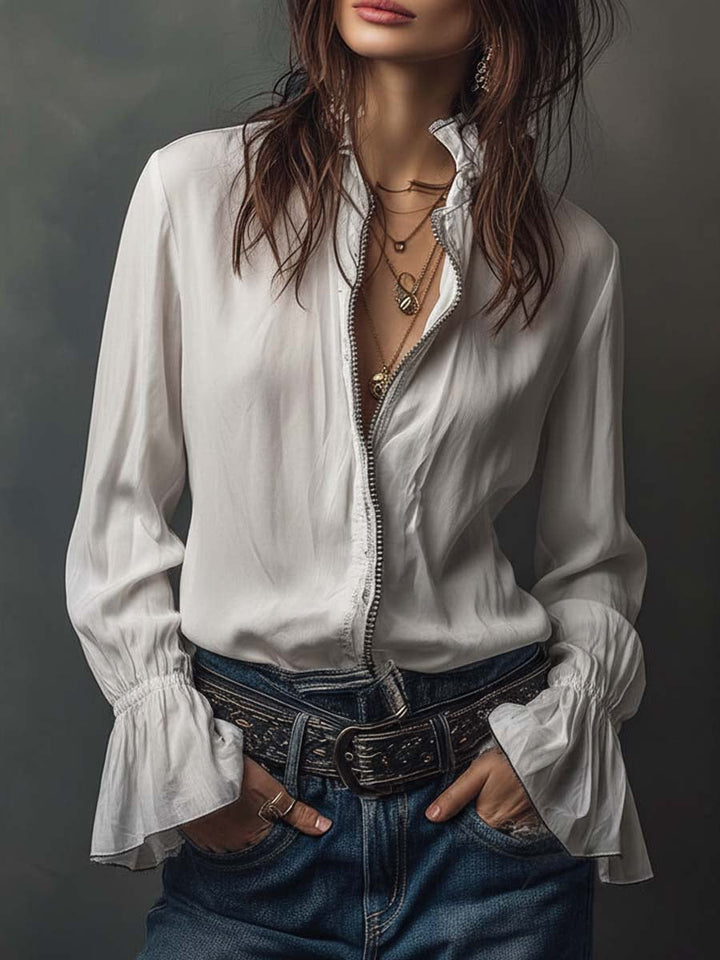 White zip-front women's blouse with elegant bell cuffs & long sleeves, perfect for office or casual wear.