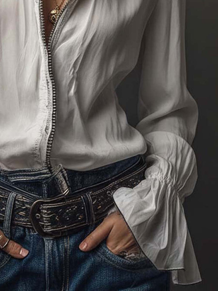 Clean white women's long-sleeve blouse with a contemporary zip front & stylish bell cuffs. Casual or office.