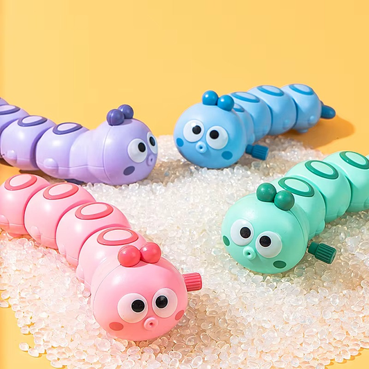 Wind-up crawling caterpillar toy for toddlers, colorful and engaging for motor skill development.