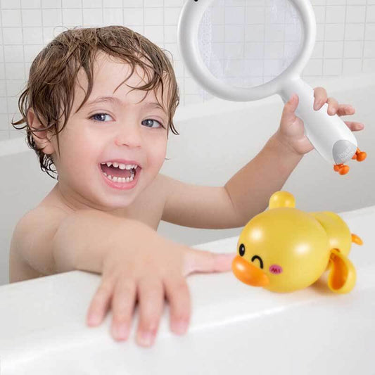 Wind-up swimming duck bath toy, vibrant yellow, floating in water