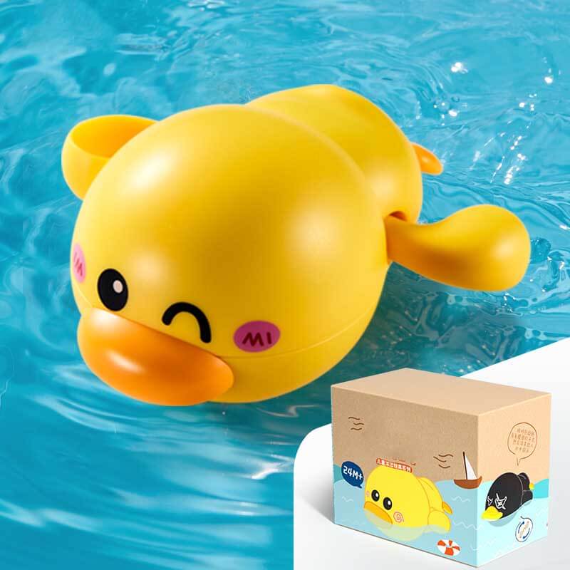 Collection of colorful wind-up swimming animal bath toys, including a duck