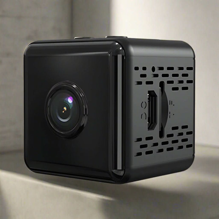 Compact wireless 1080P mini camera, ideal for indoor/outdoor discreet security and home monitoring.