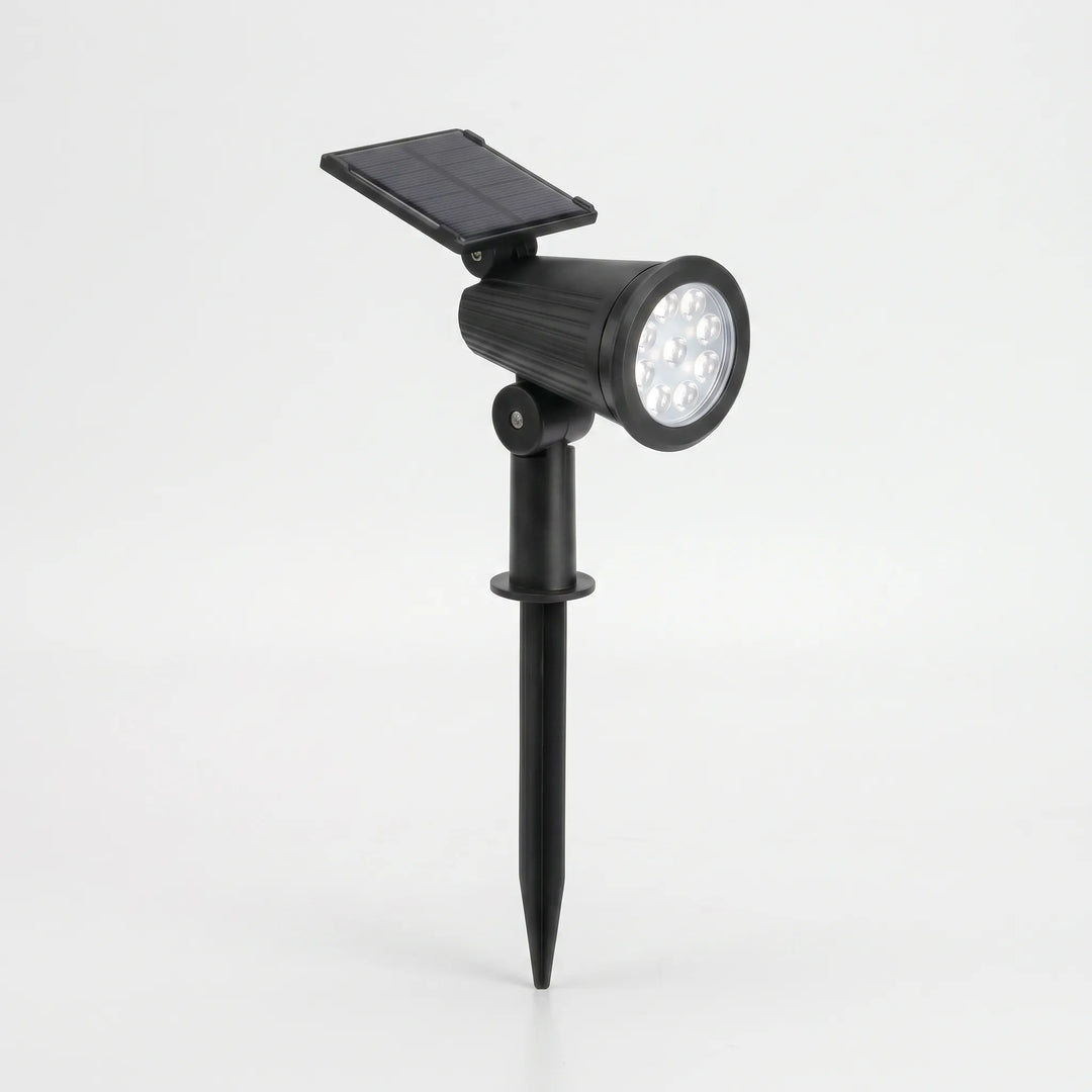 Solar pathway spotlight, adjustable LED, wireless, for bright outdoor garden lighting.