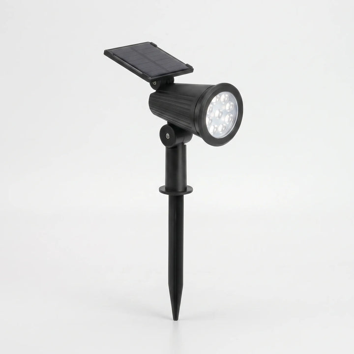 Solar pathway spotlight, adjustable LED, wireless, for bright outdoor garden lighting.