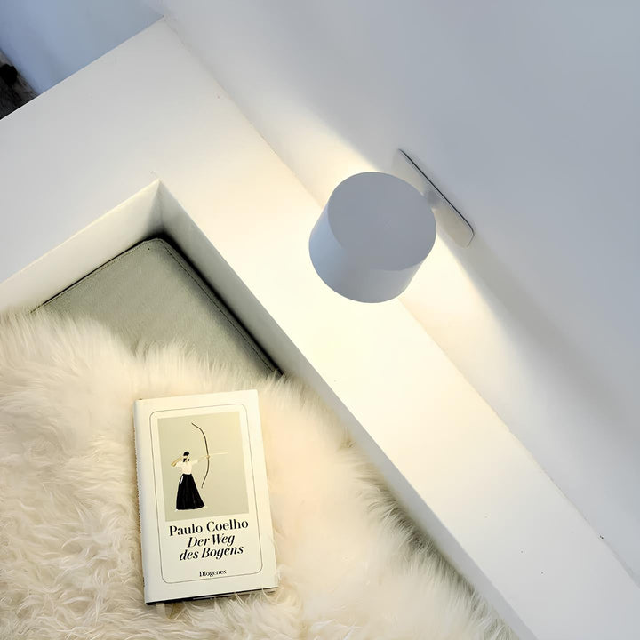 Versatile LumoFlex dimmable LED wall lamp, wireless, rechargeable for bedroom or kitchen lighting.