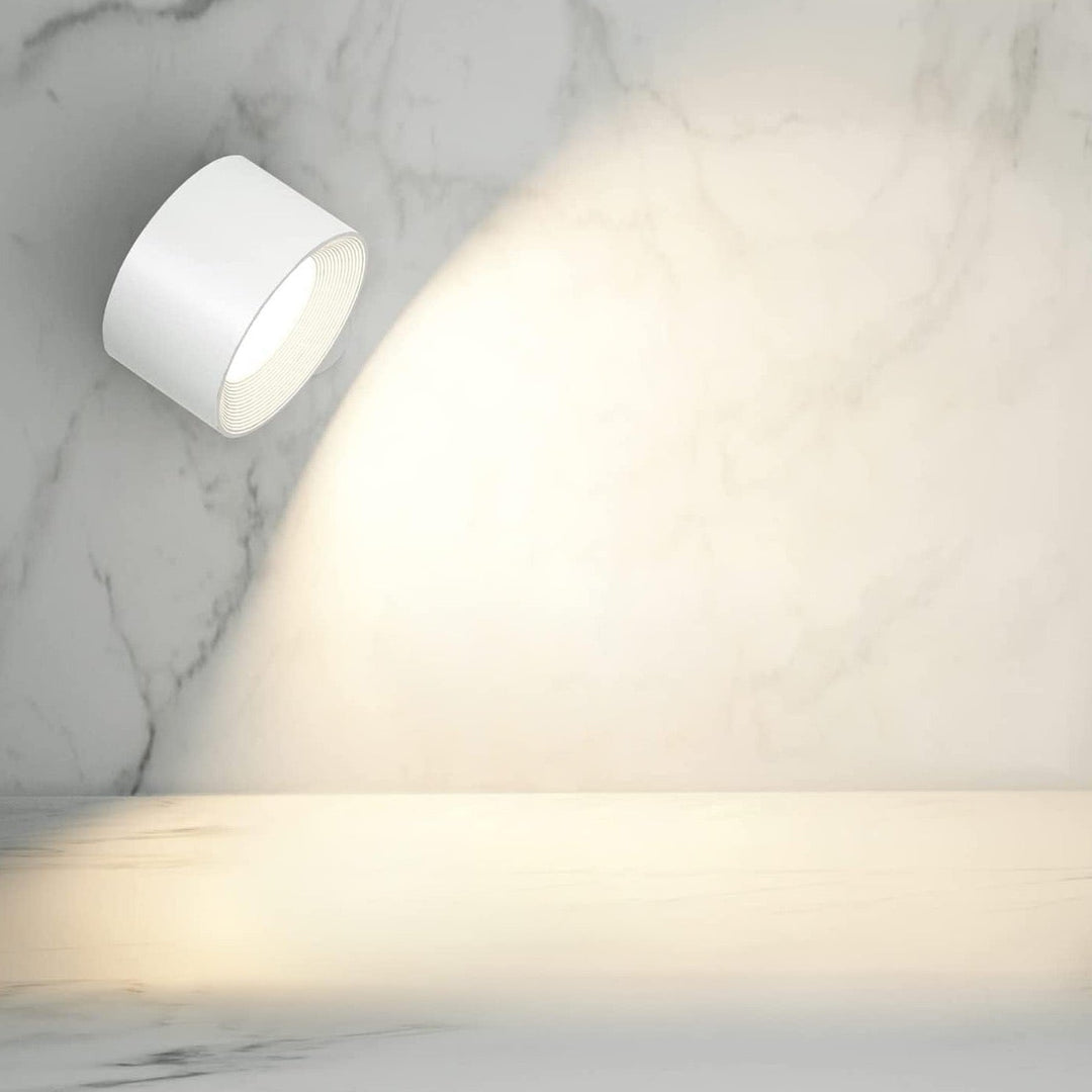 Easy-install LumoFlex magnetic wireless wall lamp, rechargeable LED light, adjustable & dimmable.