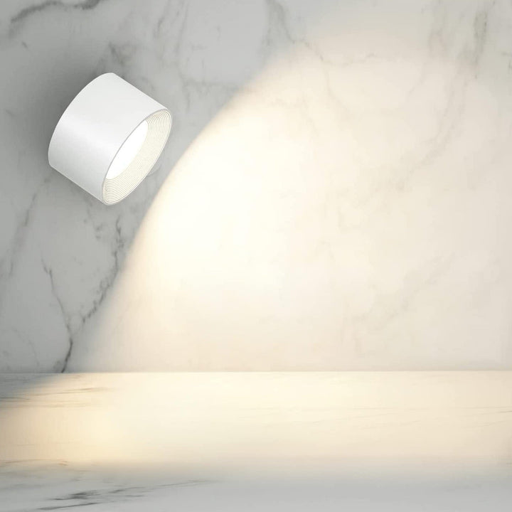 Easy-install LumoFlex magnetic wireless wall lamp, rechargeable LED light, adjustable & dimmable.