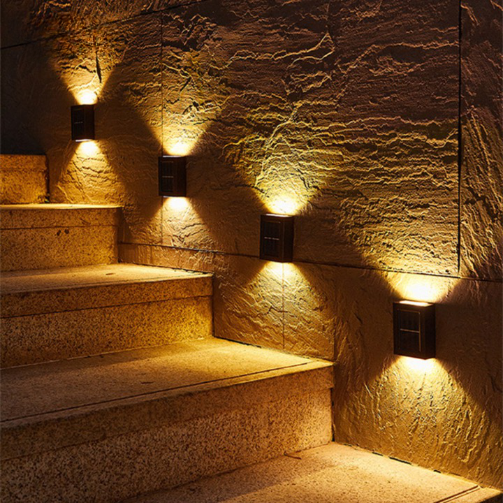 Wireless solar LED wall lamp providing outdoor ambiance & security. Eco-friendly, energy-saving garden light.