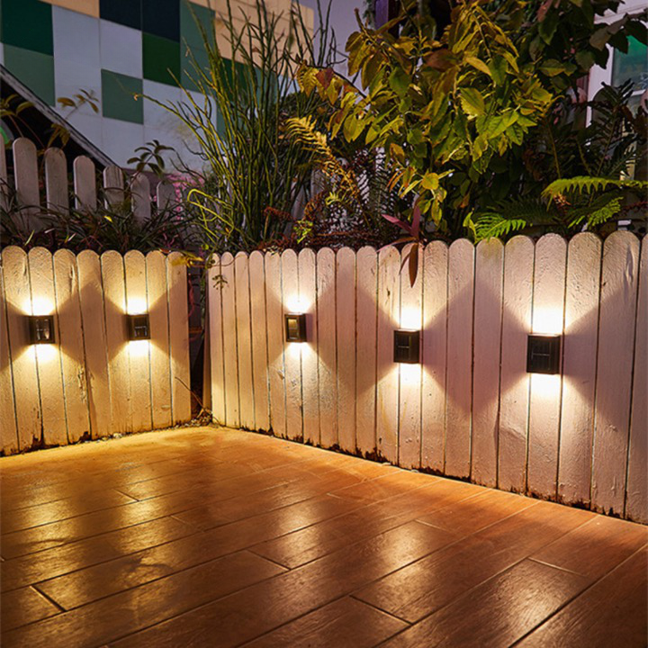 Automatic wireless solar LED wall light for outdoor garden & patio. Energy-efficient security lighting.