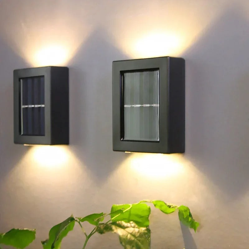 Sleek outdoor solar LED wall light for gardens. Wireless, easy install patio & driveway security lighting.