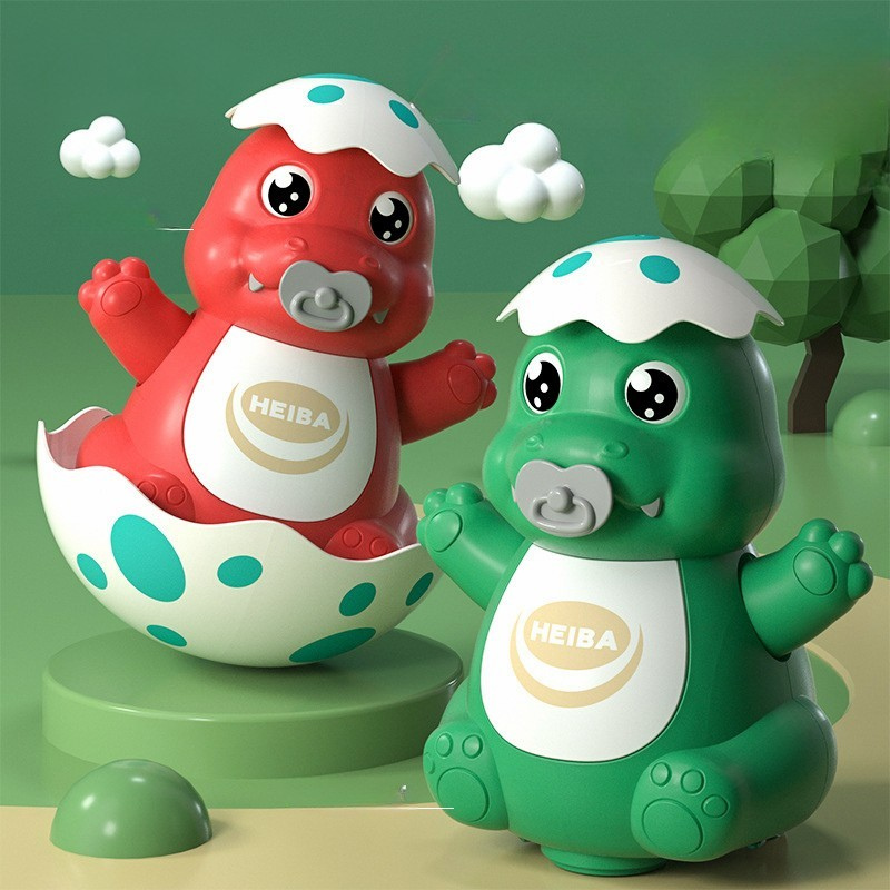 Wobbling dinosaur baby activity toy with lights and music, ideal for grasping and sensory development