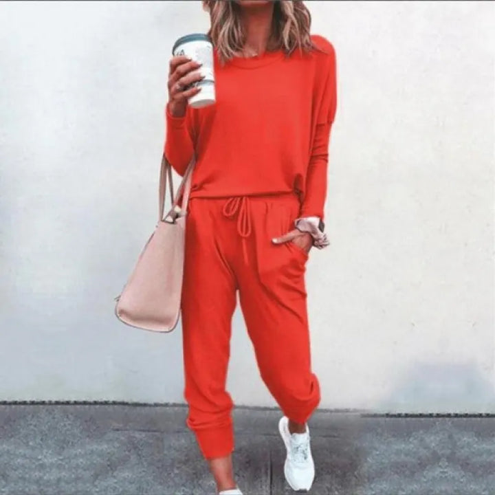 Close-up of soft, cozy fabric texture on a women's relaxed fit crew neck and jogger lounge wear set.