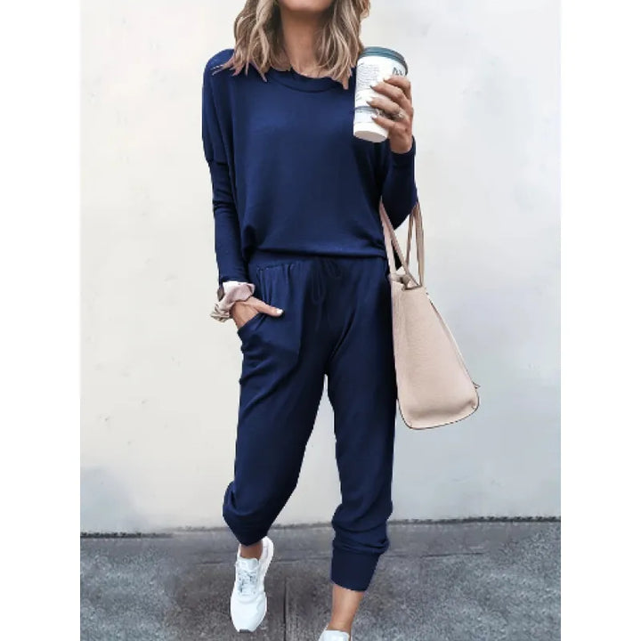 Comfortable women's long-sleeve crew neck top, a relaxed fit piece of a cozy matching athleisure set.