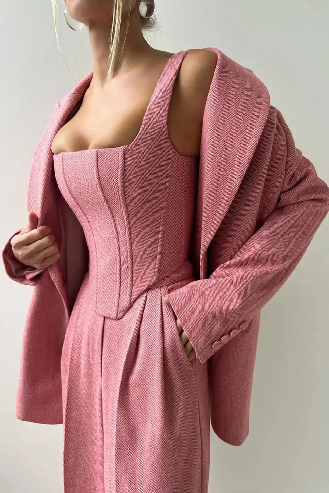 Fashionable women's 3-piece set with a corset bustier, wide leg pants, and a chic oversized blazer.
