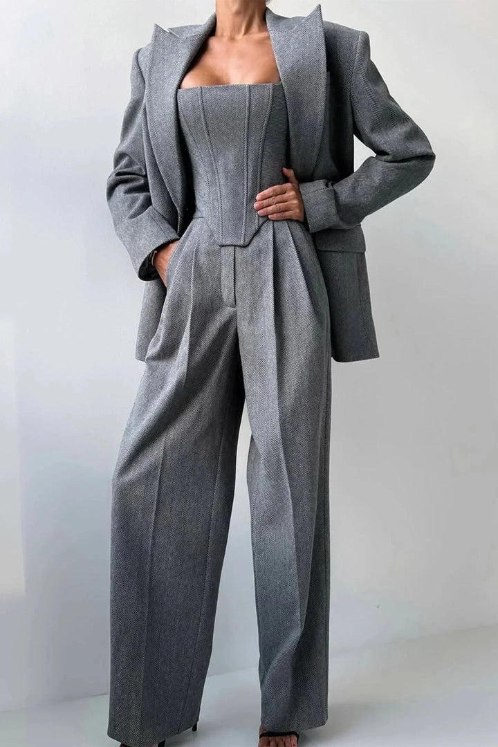 Sophisticated women's co-ord set with corset bustier, wide leg pants & oversized blazer. Perfect for evening.