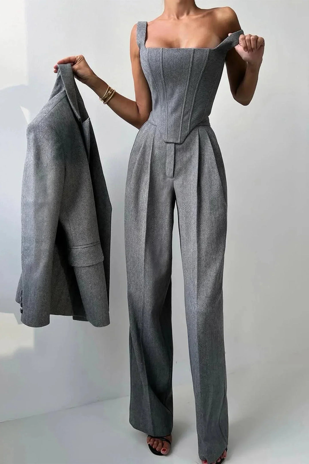 Chic women's blazer, wide leg pants & corset bustier co-ord set. Ideal for sophisticated evening wear.