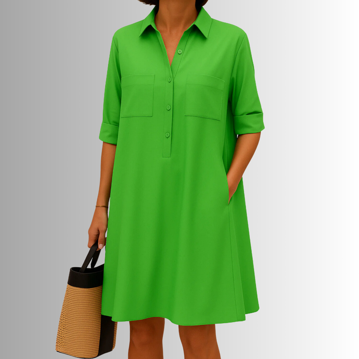 Women's A-line button dress with 3/4 sleeves and collar. Effortlessly stylish for summer and everyday wear.