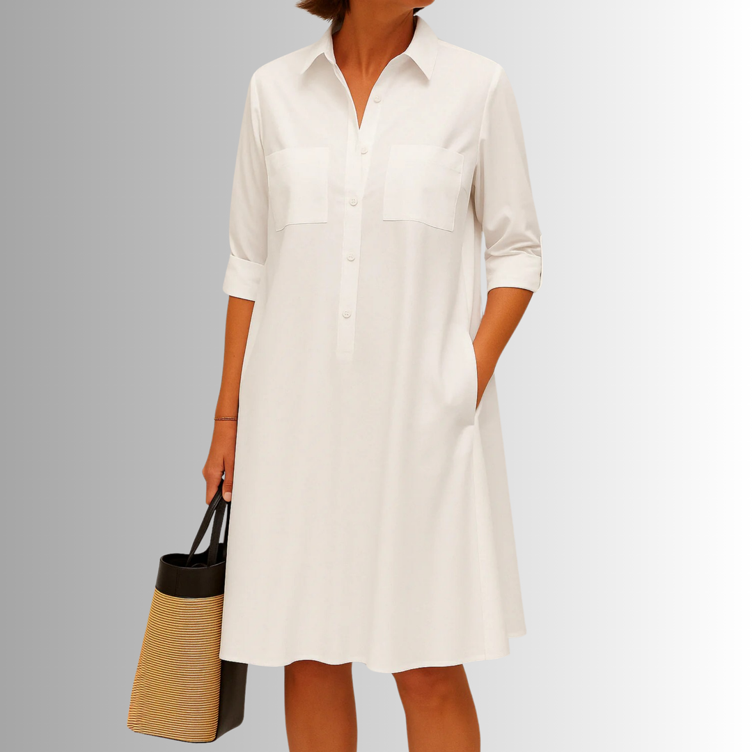 Comfortable women's A-line swing dress with buttons and pockets. Perfect versatile casual day dress.