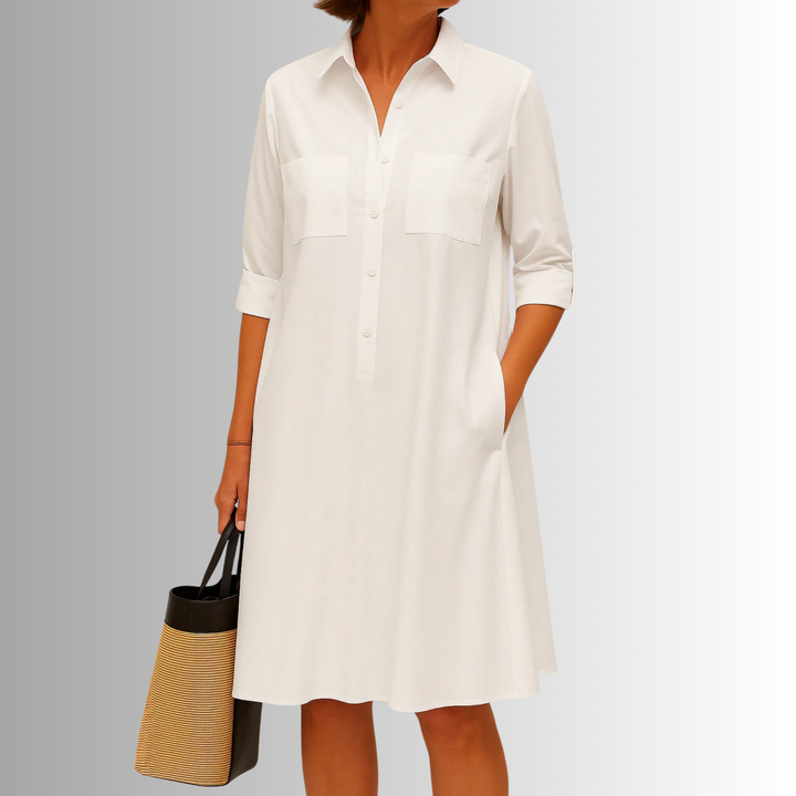 Comfortable women's A-line swing dress with buttons and pockets. Perfect versatile casual day dress.