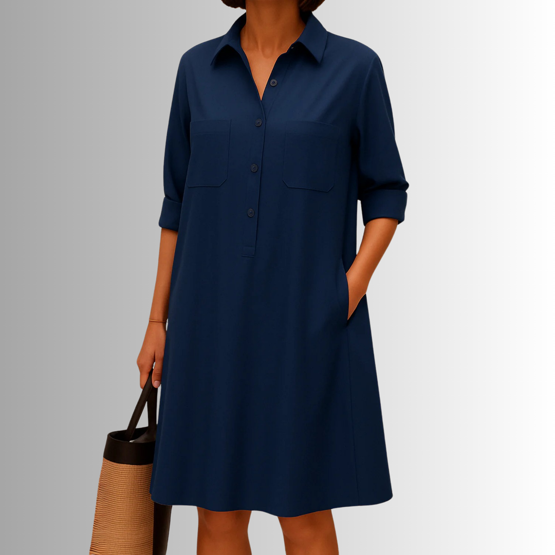 Elegant women's collared A-line dress, featuring front buttons and 3/4 sleeves. Ideal for daily comfort.