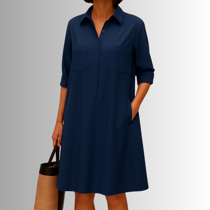 Elegant women's collared A-line dress, featuring front buttons and 3/4 sleeves. Ideal for daily comfort.