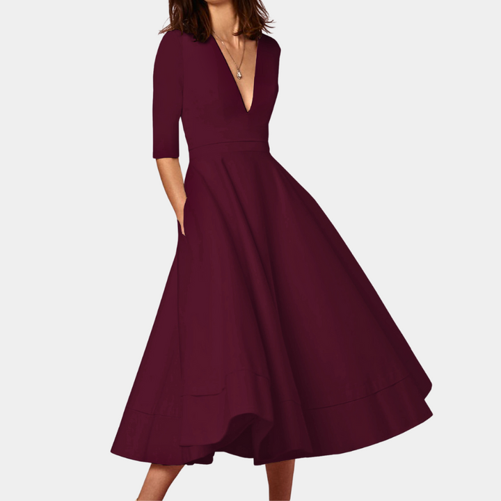 Stylish women's sleeveless A-line midi dress, featuring a tasteful side slit for effortless spring & summer looks.