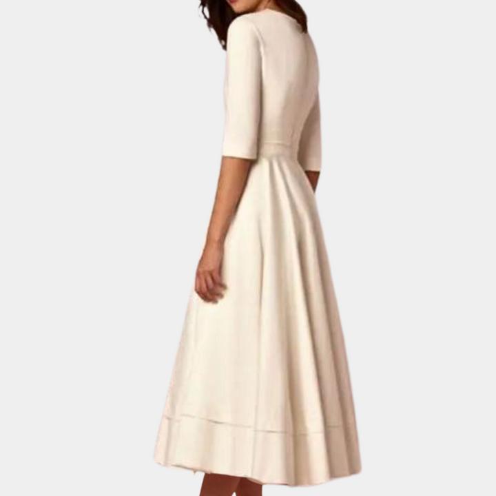 Timeless women's A-line midi dress, sleeveless & elegant with a stylish side slit. A versatile fashion staple.