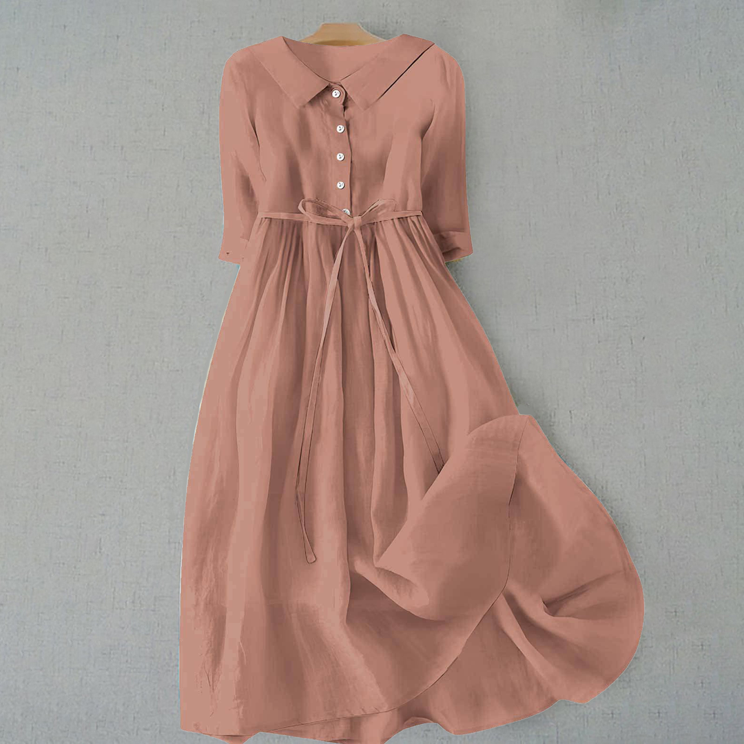 Women's short sleeve A-line casual midi dress, comfortable & versatile for everyday spring & summer fashion.