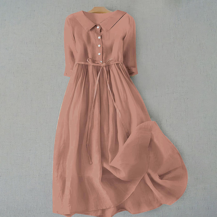 Women's short sleeve A-line casual midi dress, comfortable & versatile for everyday spring & summer fashion.