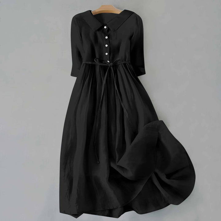 Fashionable women's A-line casual midi dress with short sleeves, easy care and effortless style.