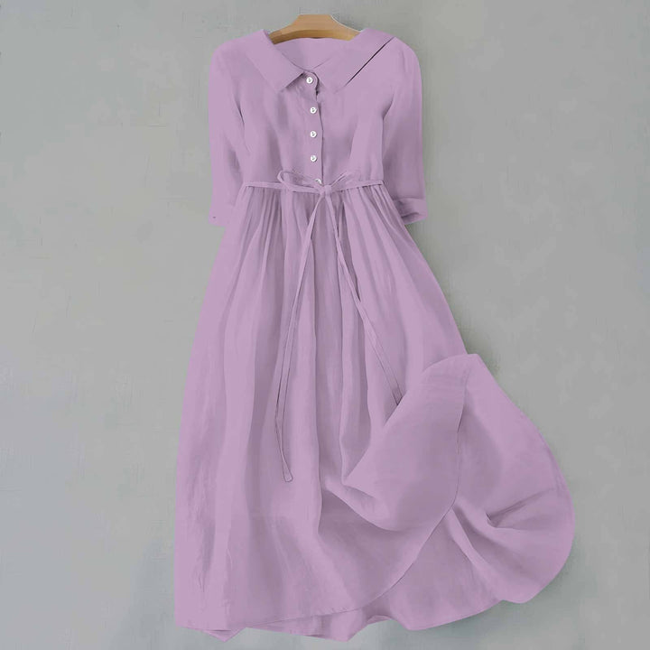 Colorful women's A-line midi dress, short sleeves, a relaxed fit for comfortable casual spring outfits.