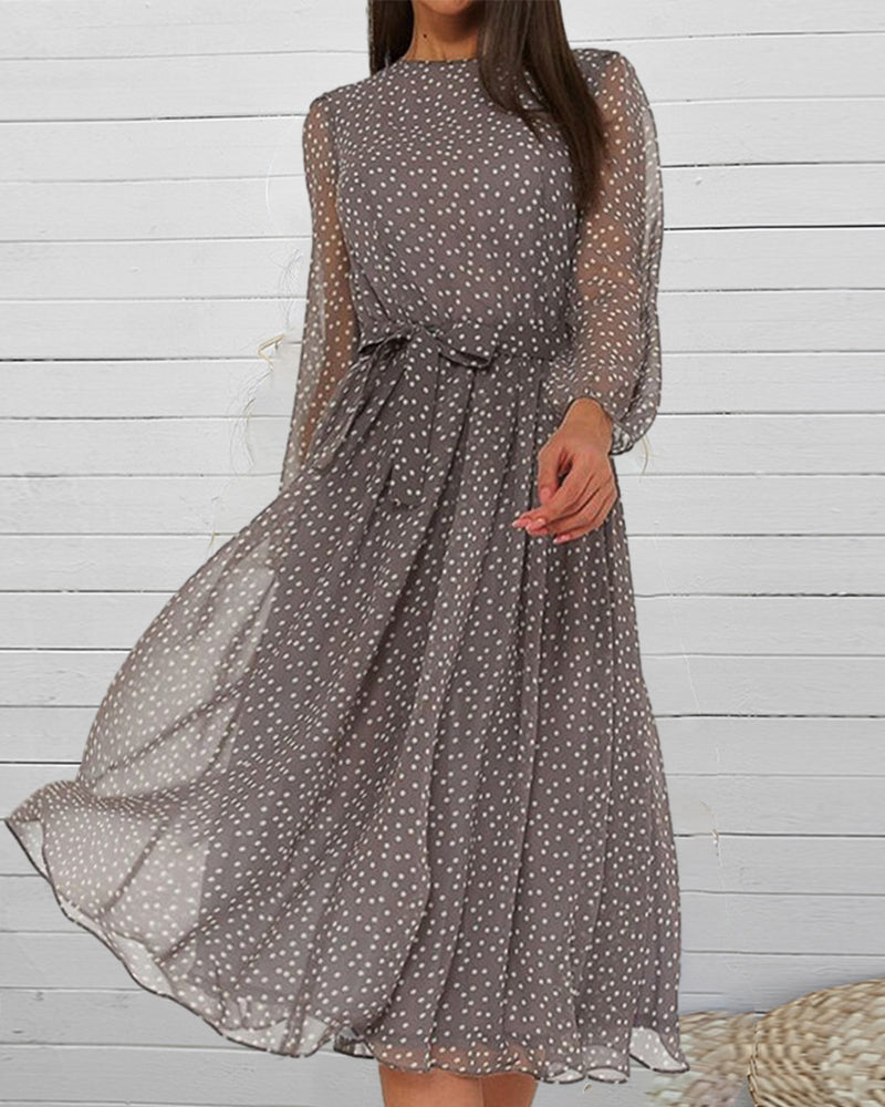 Versatile women's A-line polka dot dress, knee-length with relaxed fit & elegant lantern sleeves.