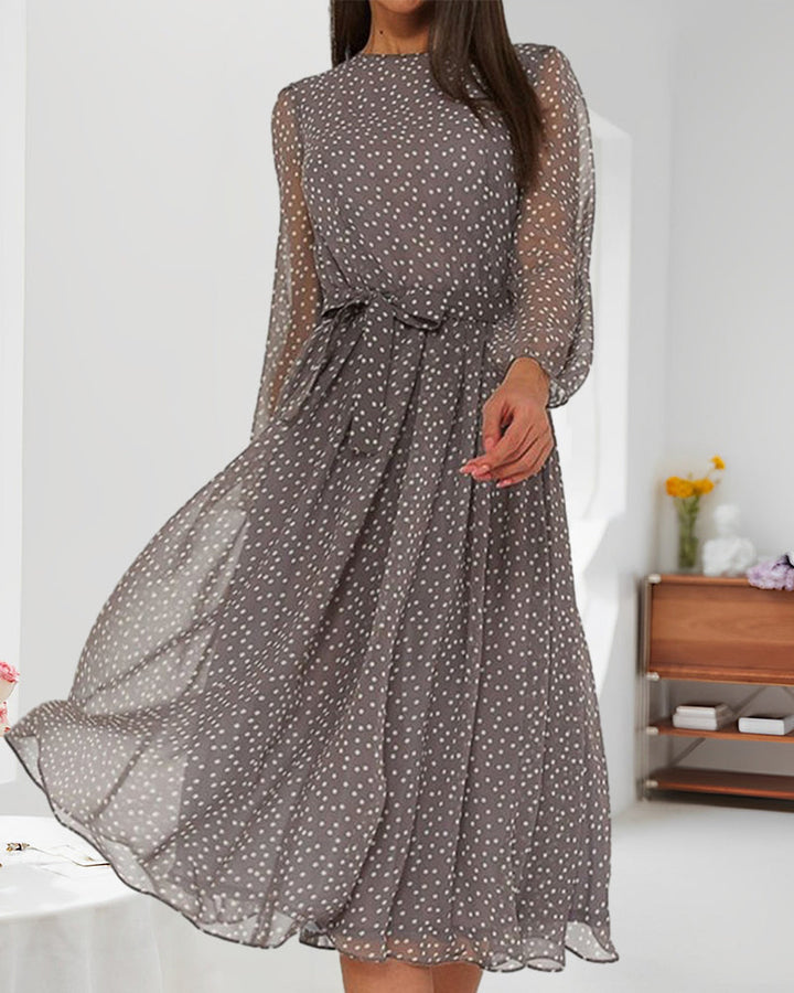 Elegant women's polka dot A-line dress for spring/autumn. Features a round neck & stylish lantern sleeves.