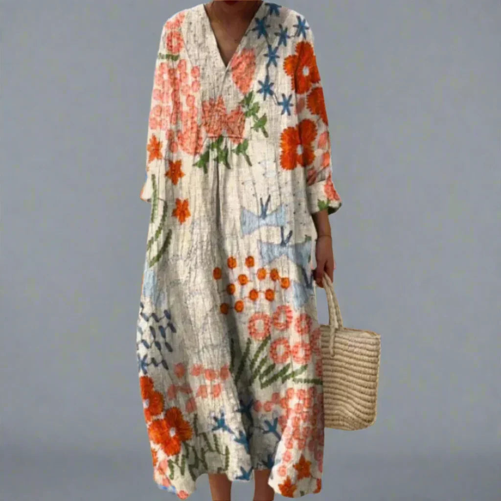 Women's abstract floral V-neck long sleeve dress; colorful, flowy, and versatile for casual or evening wear.