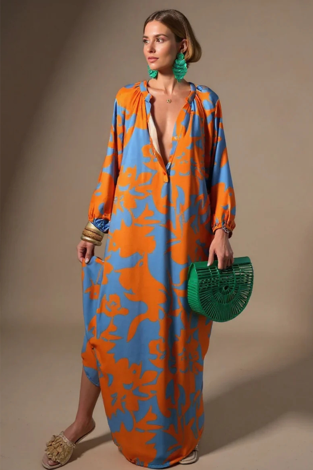 Flowy V-neck kaftan maxi dress for women featuring a vibrant abstract print, ideal for summer fashion.