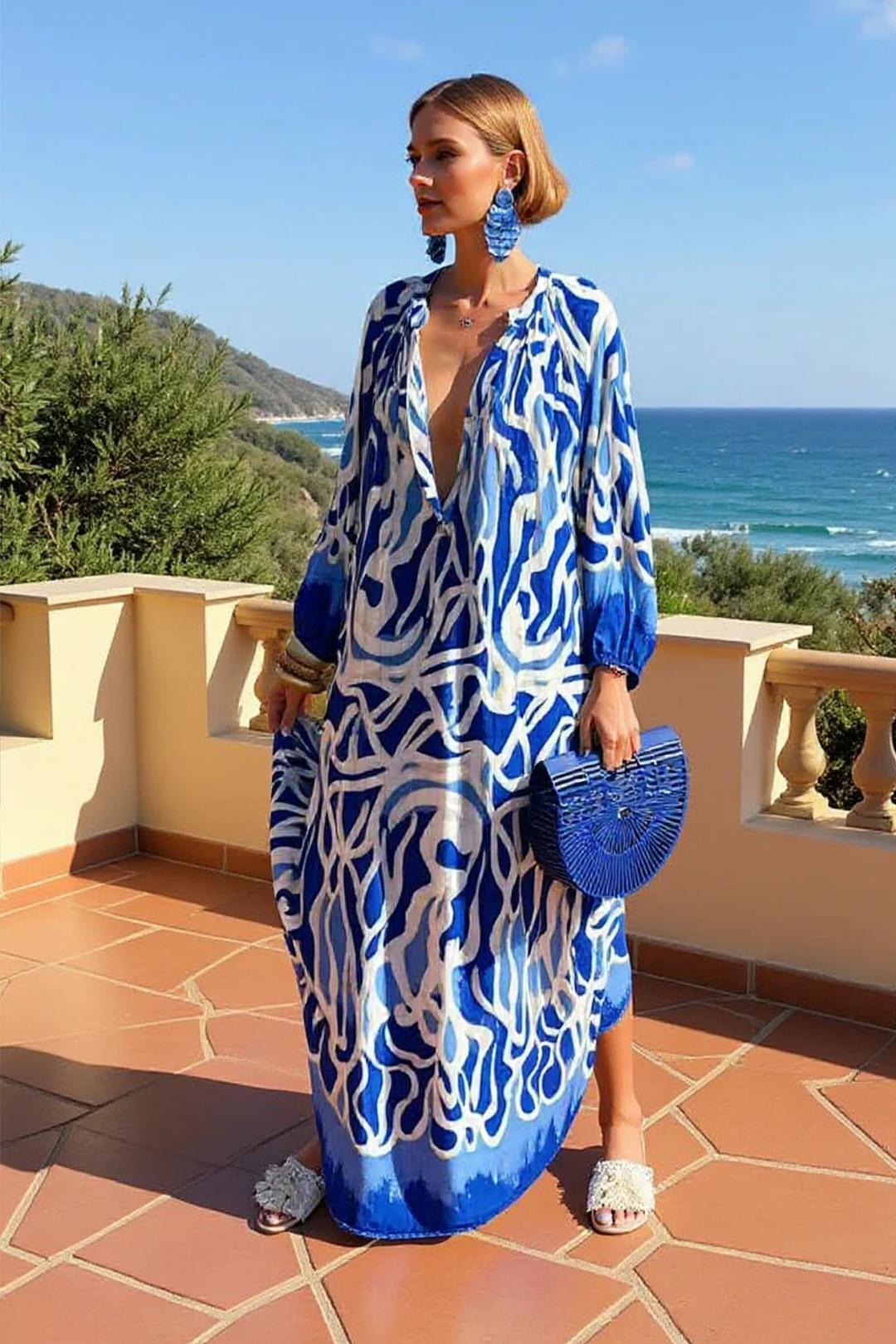 Elegant women's abstract print kaftan maxi dress with a flattering V-neck, great for casual elegance.