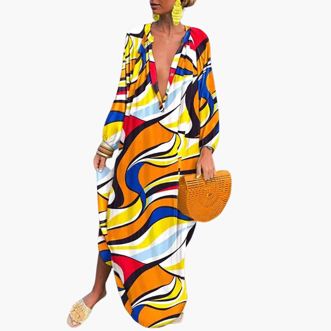 Elegant women's abstract print long maxi dress with V-neck, ideal for summer beach vacation or resort wear.