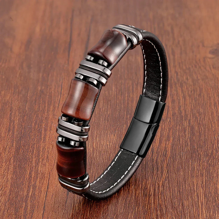Close-up of rich brown & gold tiger's eye beads on an adjustable women's bracelet, highlighting gemstone detail.