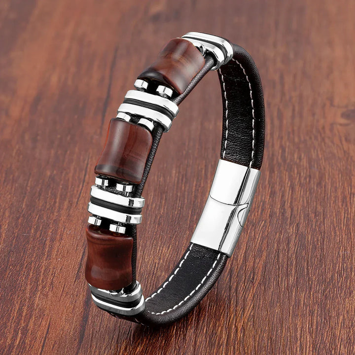 Elegant women's tiger's eye bracelet on a wrist, showcasing its adjustable fit and stylish fashion appeal.