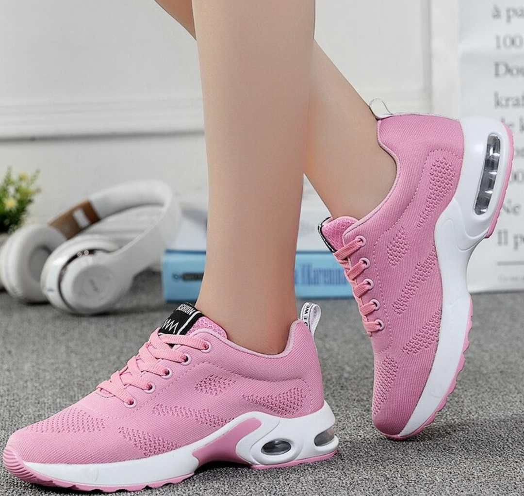 Breathable women's air-cushioned trainers. Stylish & comfortable for casual wear or sports activities.