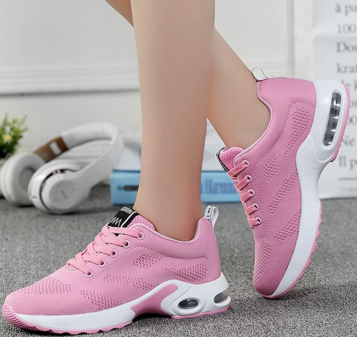 Breathable women's air-cushioned trainers. Stylish & comfortable for casual wear or sports activities.