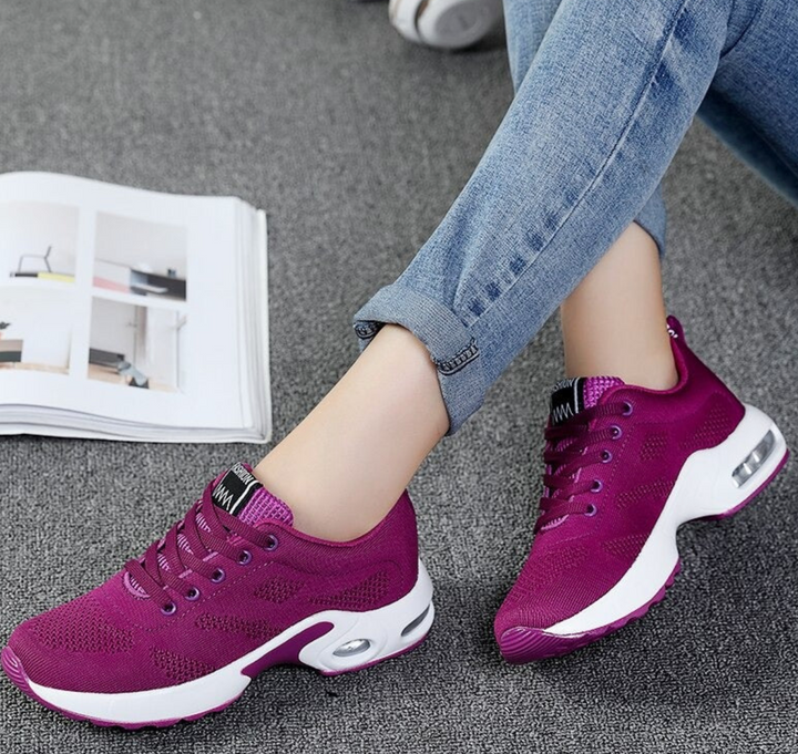 Women's ultimate comfort air-cushioned athletic shoes. Provides orthopedic support for active women.