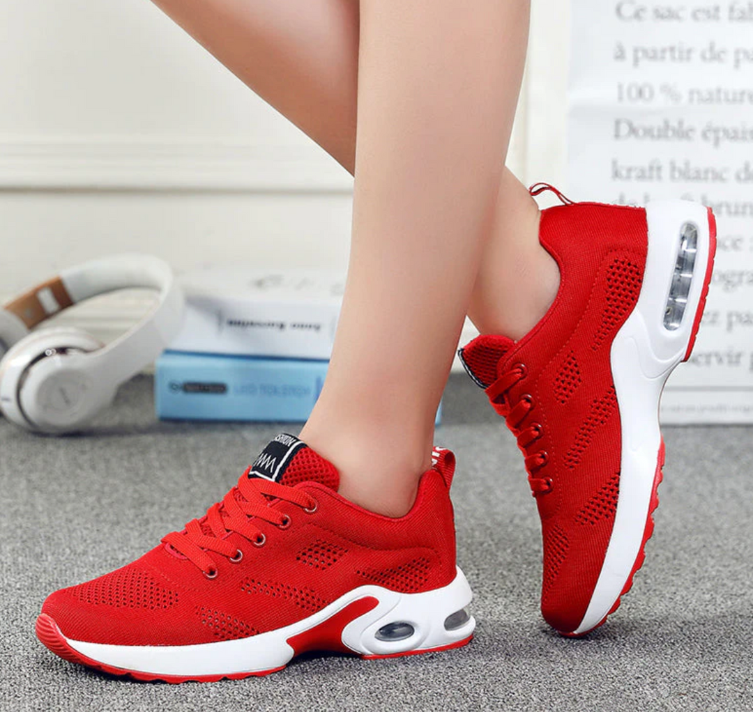 Athletic women's air-cushioned sneakers for sports footwear, running, and comfortable everyday use.
