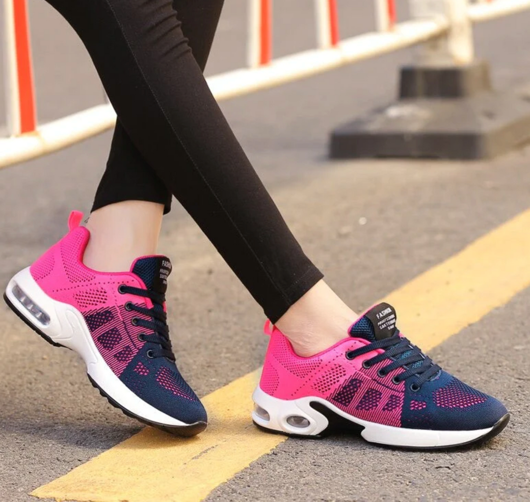 Comfortable women's trainers with air cushioning, ideal for walking, casual wear, and light sports.