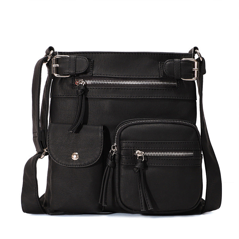 Women's anti-theft crossbody bag, sleek black design, perfect for secure daily commutes & travel.