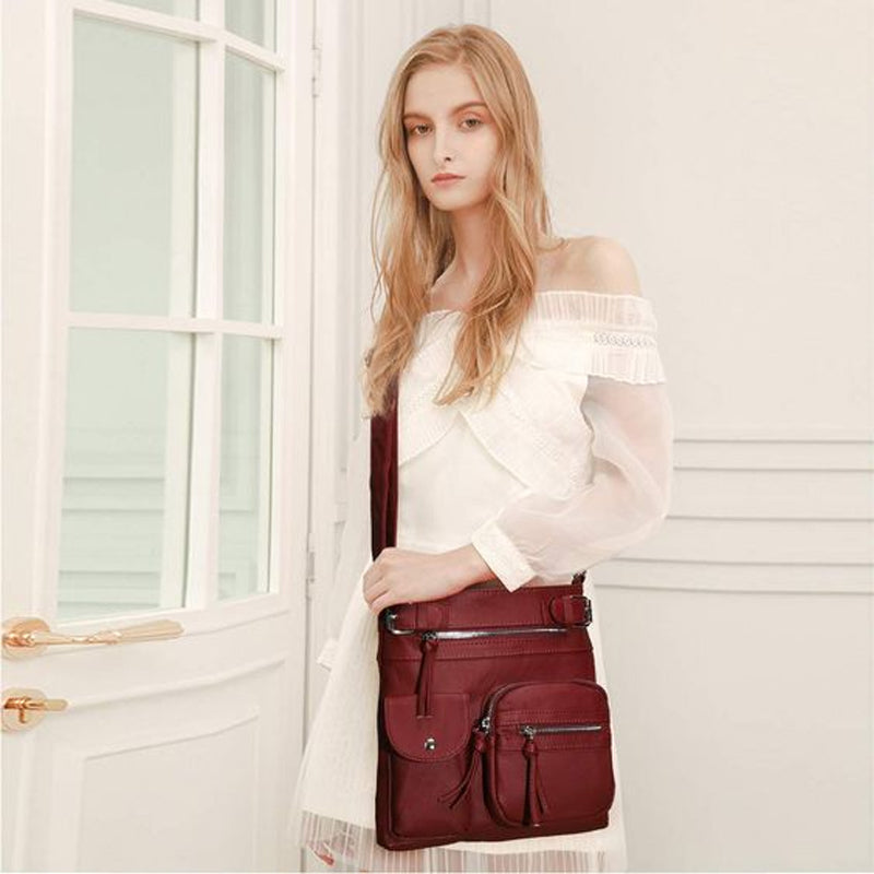 Secure women's travel bag, anti-theft design, worn comfortably across body, protecting essentials.