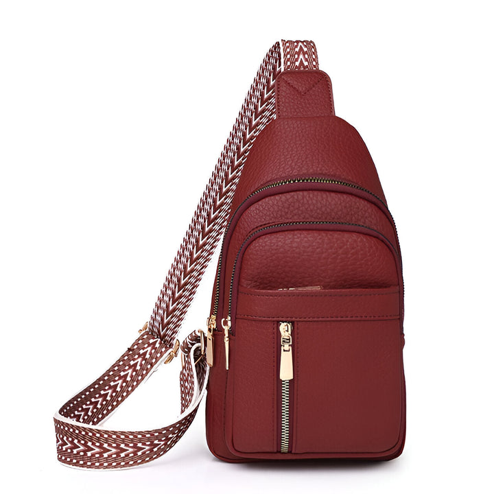 Compact women's anti-theft utility bag with an eye-catching patterned strap, great for keeping essentials safe.