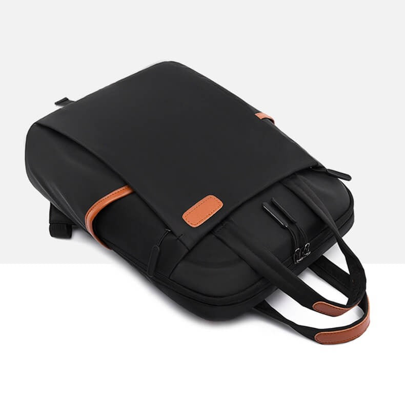 Anti-theft work backpack for women, sleek design, protects essentials on daily commute.